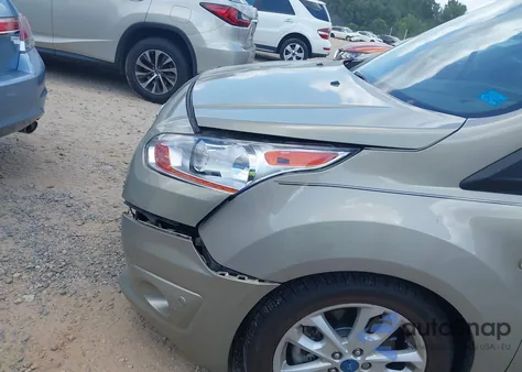 2015 Ford Transit Connect Titanium z USA, uszkodzony, nr VIN NM0GE9G79F1194891